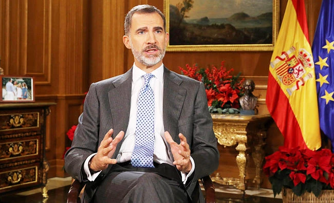 Spanish King Felipe VI delivers his Christmas Eve message at the Royal Palace in Madrid on Sunday. (AFP)