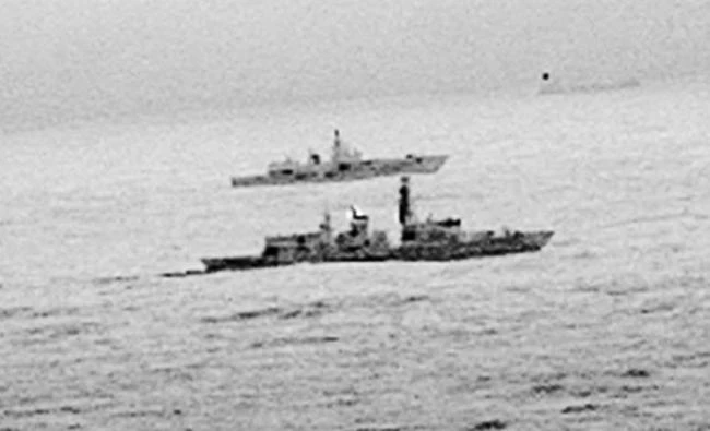 Images from an infrared camera on a helicopter show Royal Navy frigate HMS St Albans escorting Russian warship Admiral Gorshkov as it passes close to UK territorial waters through the North Sea in an image from an infrared camera on a helicopter handed out by Britain's Royal Navy, on Monday. (REUTERS)