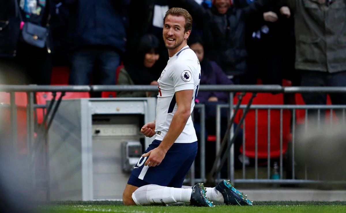 Tottenham Hotspur’s English striker Harry Kane celebrates after he scores the opening goal of the English Premier League football match between Tottenham Hotspur and Southampton at Wembley Stadium in London, on Dec.26, 2017. (AFP)