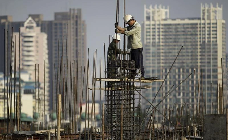 China has defied market expectations with 6.9 percent growth in the first nine months of the year amid the construction boom and solid exports. (Reuters)