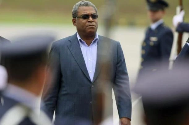 Jean-Max Bellerive arrives at the Catam military airport in Bogota August 6, 2010, ahead of Colombia’s president-elect Juan Manuel Santos’ inauguration ceremony on Saturday. (Reuters)