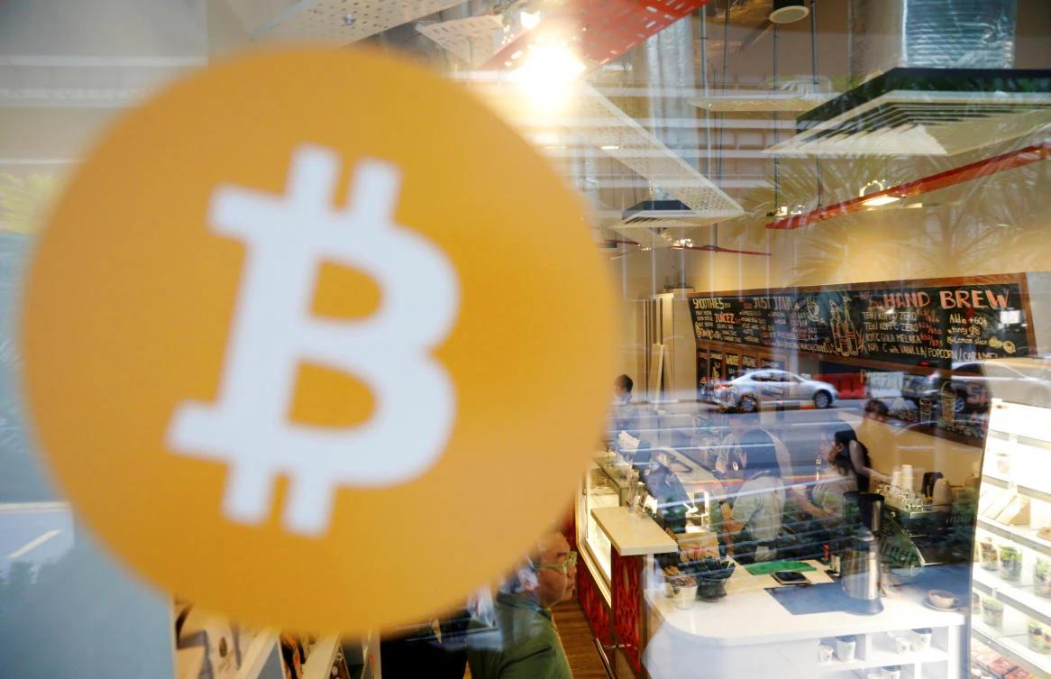 Bitcoin, the world’s biggest and best-known cryptocurrency, has gained more than 19-fold this year. Above, Ducatus cafe in Singapore, the first cashless cafe that accepts cryptocurrencies such as bitcoin. (Reuters)