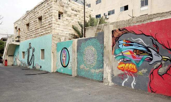A graffiti mural on a wall in the Jordanian capital Amman. (AFP)