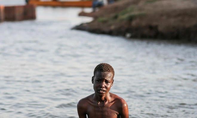 A Sudanese boy swims in the Nile River in Khartoum, Sudan. (File/AP)