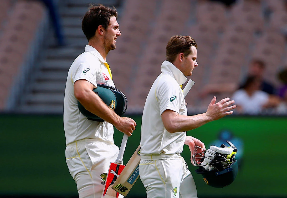 Australia’s Steve Smith, right, and team mate Mitchell Marsh walk off the ground at the end of the fourth Ashes test. (Reuters)
