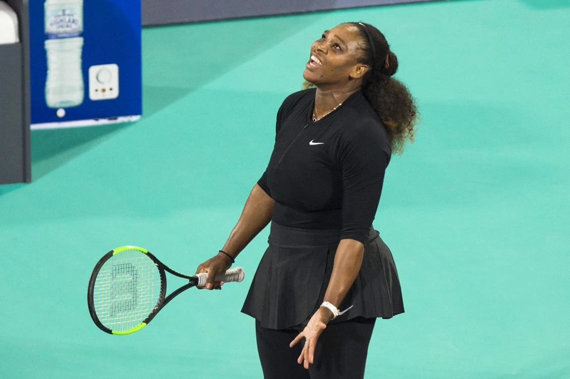 Serena Williams reacts after losing a point to Jelena Ostapenko during the Mubadala World Tennis Championship in Abu Dhabi. (AFP)