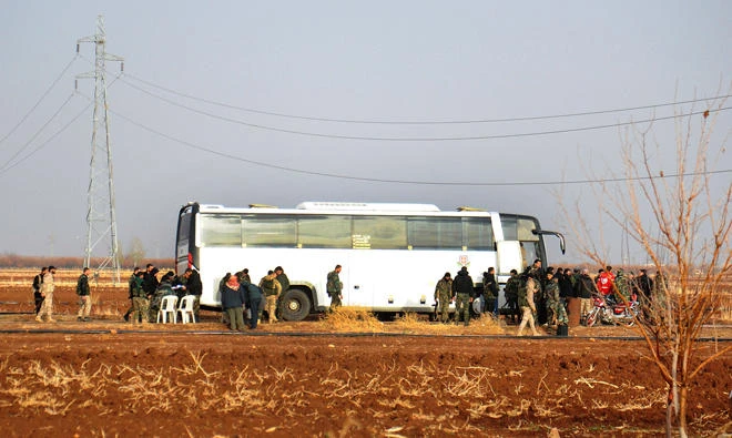 Dozens of militants evacuated from southern Syria
