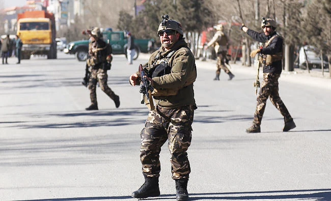 Security personnel arrive outside the site of a suicide attack in kabul, Afghanistan, in this Dec. 28, 2017 photo. (AP)