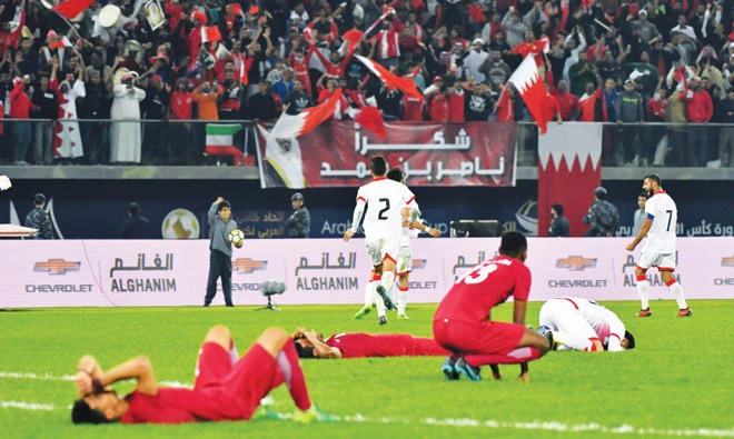 Bahrain go wild after their draw against Qatar. (AFP)