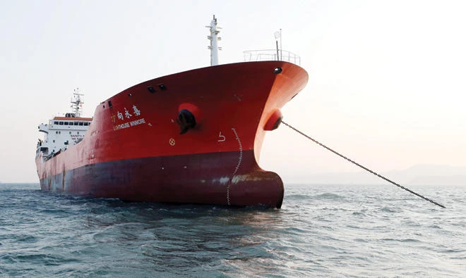 The Lighthouse Winmore, a Hong Kong-flagged vessel suspected of transferring oil to North Korea in defiance of international sanctions, is seen in the sea off Yeosu, South Korea, on Friday. (Reuters)