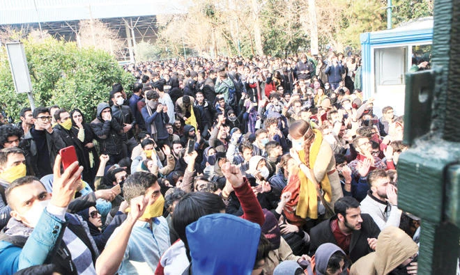 Students take part in a protest inside Tehran University. (AP)