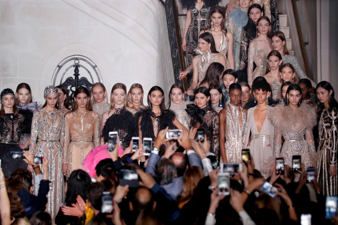 Models present creations by designer Elie Saab as part of his Haute Couture Spring-Summer 2018 fashion show in Paris, France, January 24, 2018. REUTERS/Charles Platiau