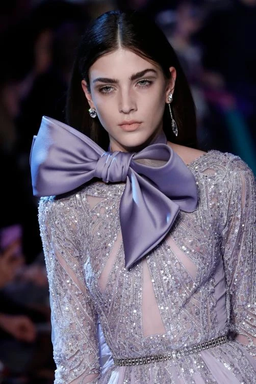 A model presents a creation by Elie Saab during the 2018 spring/summer Haute Couture collection fashion show on January 24, 2018 in Paris. / AFP / Patrick KOVARIK