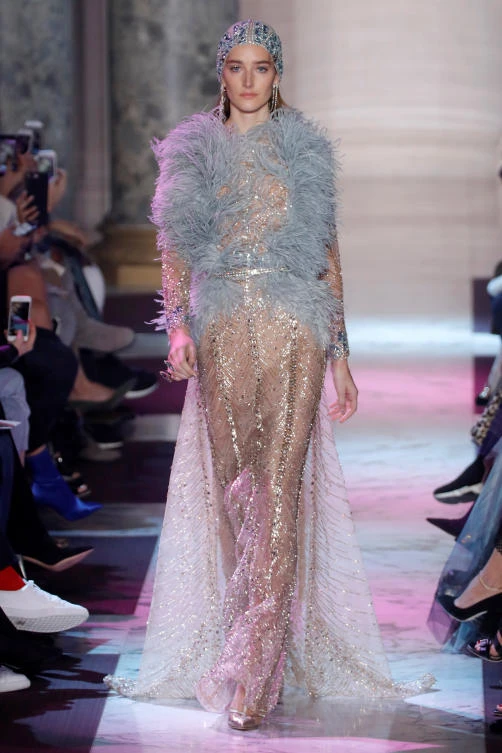 A model presents a creation by designer Elie Saab as part of his Haute Couture Spring-Summer 2018 fashion show in Paris, France, January 24, 2018. REUTERS/Charles Platiau