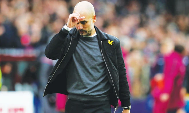 LET-OFF: Pep Guardiola paid Crystal Palace credit after they ended his side’s record run. (Reuters)