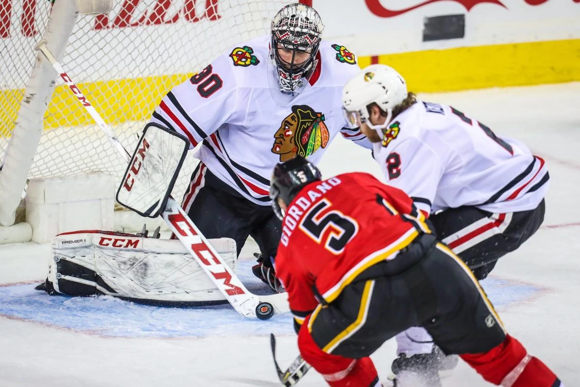 Giordano scores in OT to lift Flames over Blackhawks