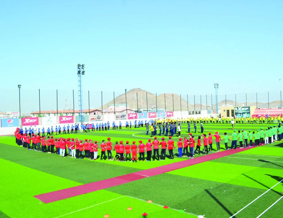 Participants perform a drill at the sports meet.