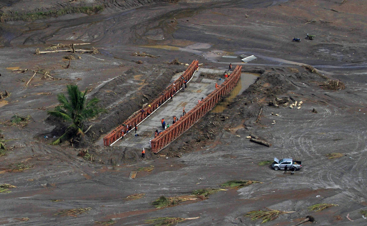 Two dead, thousands flee in storm-weary Philippines