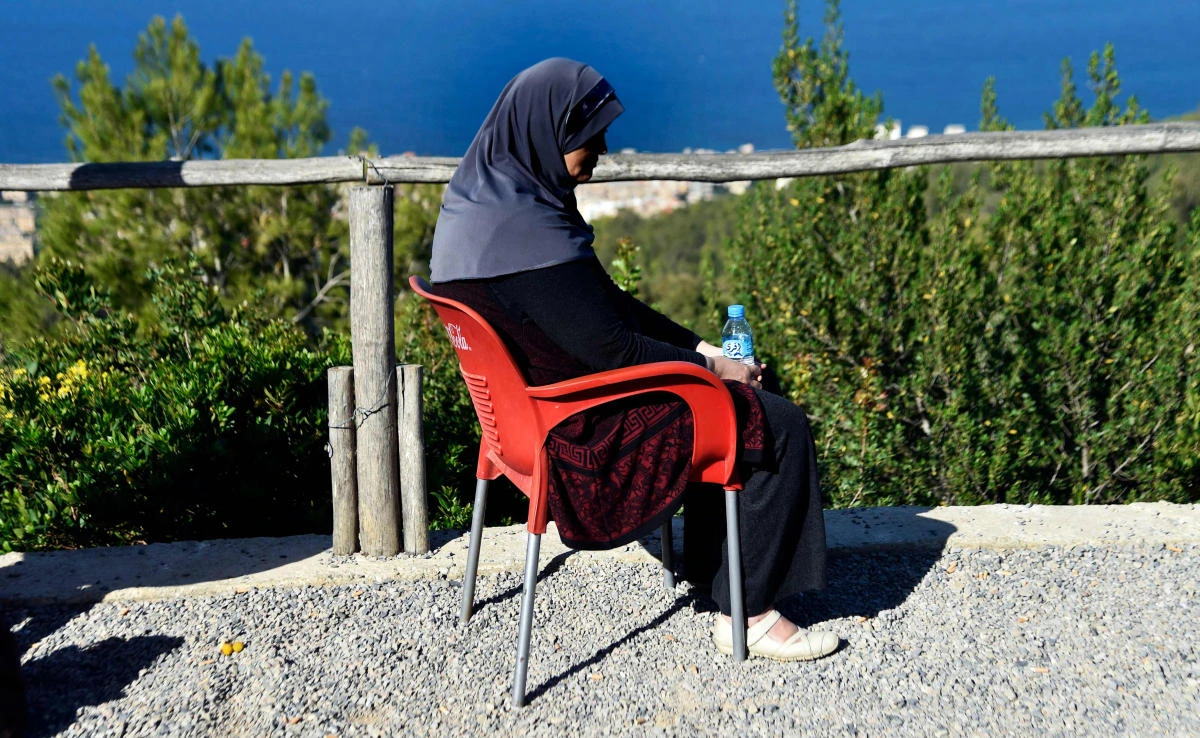 This file photo shows Linda, an Algerian mother-of-three who was abandoned by her husband after being diagnosed with breast cancer, sitting in Algiers on Nov. 15, 2017. (AFP)