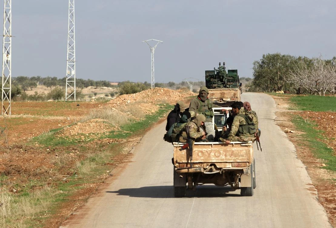 Syrian opposition fighters, above, are fighting to lift the siege imposed on the Damascus suburb of Eastern Ghouta. (AFP)