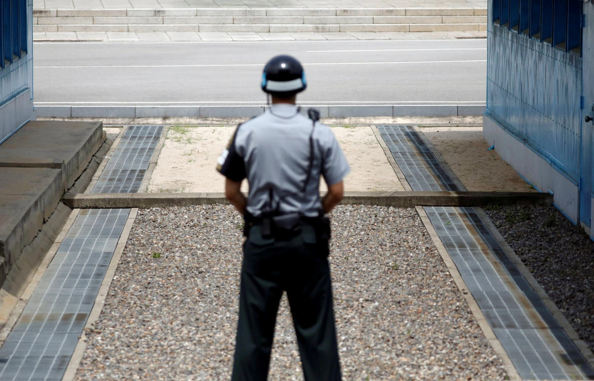 Above, a South Korean soldier stands guard at the truce village of Panmunjom. South Korea proposed high-level discussions with North Korea following Kim Jong Un’s earlier New Year’s address. (Reuters)
