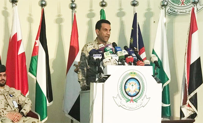 Col. Turki Al-Maliki, spokesman for the Saudi-led coalition talks at a press conference in Riyadh. (AN photo/Noor Nugali)