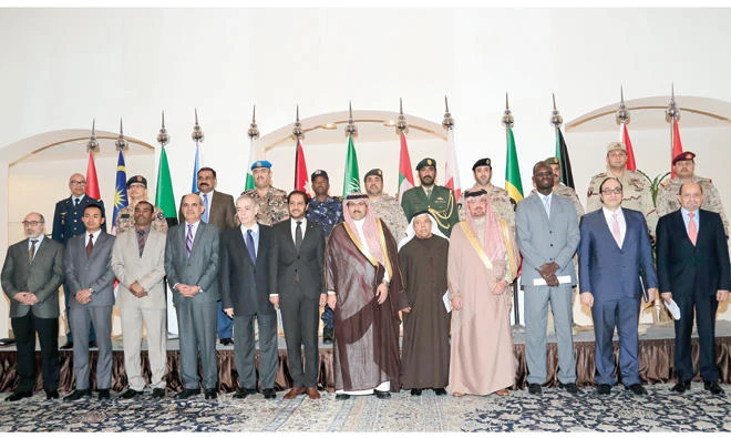 Ambassadors and military attaches of the Saudi-led Coalition to Support Yemen pose for a group photo after their meeting in Riyadh on Wednesday. (AN photo by Basher Saleh)