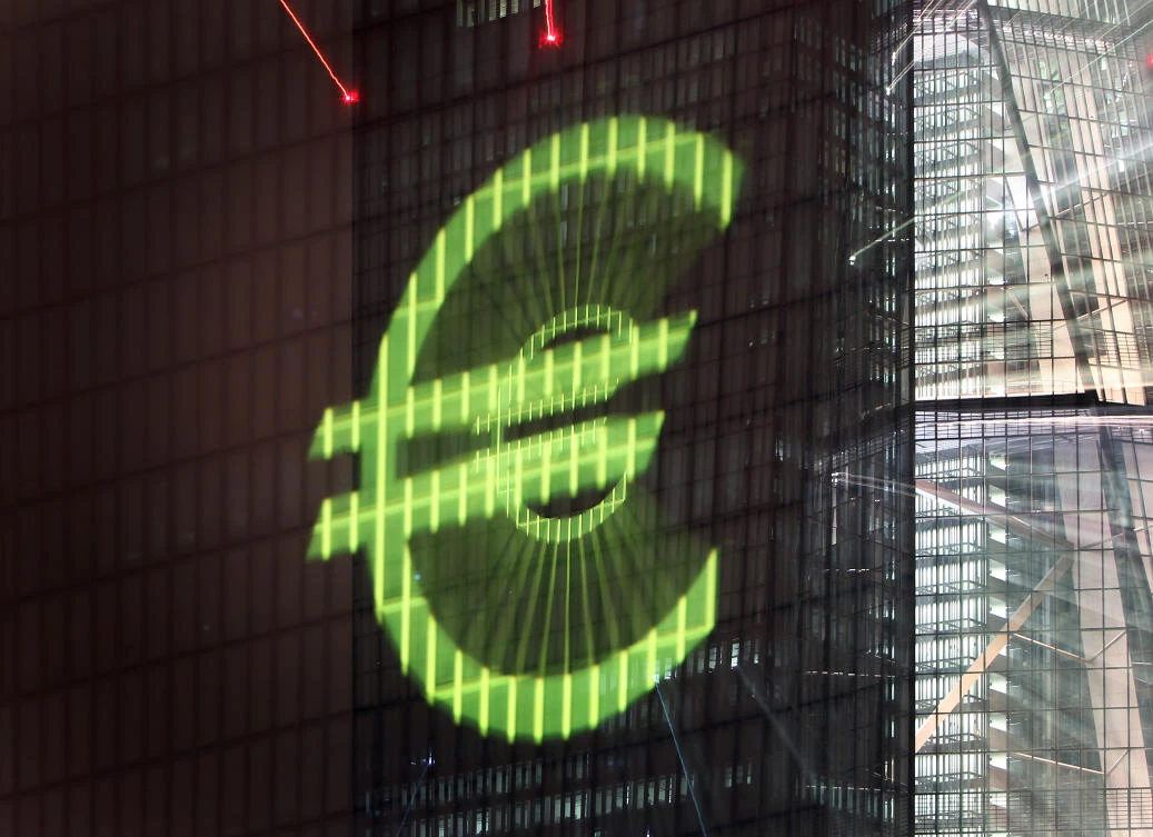 The 19-country eurozone economy closed out 2017 growing stronger than at any time in nearly seven years and optimism about the year ahead remaining buoyant. Picture shows the Euro-logo projected onto the main building of the European Central Bank, ECB during a rehearsal of the “Luminale” in Frankfurt/Main, Germany. (AFP)