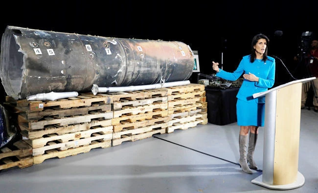 US Ambassador to the United Nations Nikki Haley briefs the media in front of remains of Iranian "Qiam" ballistic missile provided by Pentagon at Joint Base Anacostia-Bolling in Washington. (Reuters)