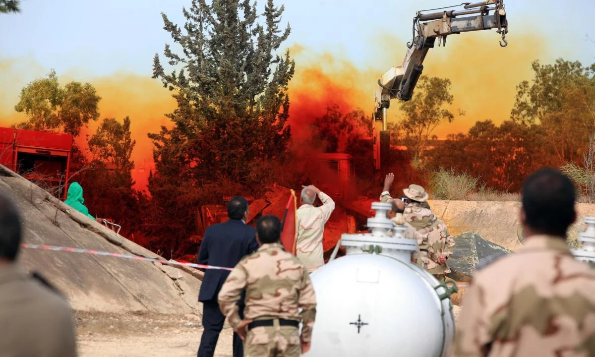 Experts in Tripoli monitor a November 2012 operation to dispose of Libyan chemical weapons. (AFP)