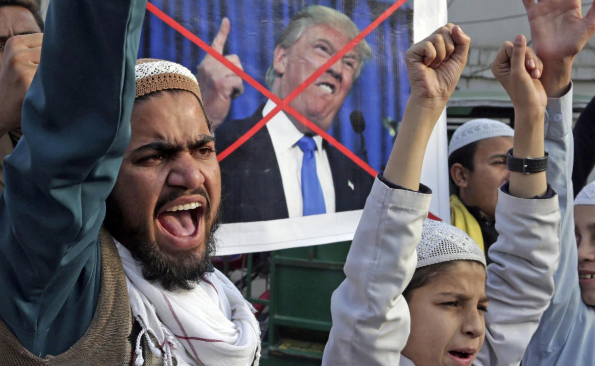 Pakistani religious students protest against US President Donald Trump in Lahore, Pakistan, Friday, Jan 5, 2018. (AP)