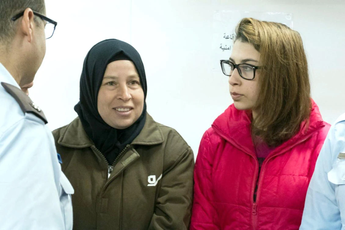 Nour Tamimi, right, with Ahed Tamimi’s mother Nariman Tamimi, left, in Ofer military court. (File photo)