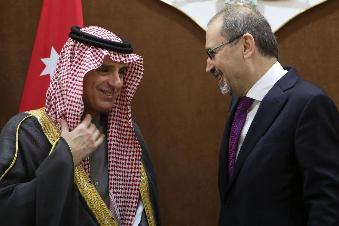 Jordanian Foreign Minister Ayman Safadi (R) talks to his Saudi counterpart Adel Al-Jubeir ahead of a meeting in the Jordanian capital Amman. The foreign ministers of six Arab countries met for talks on Jerusalem, after US President Donald Trump recognized the city as Israel’s capital.(AFP)