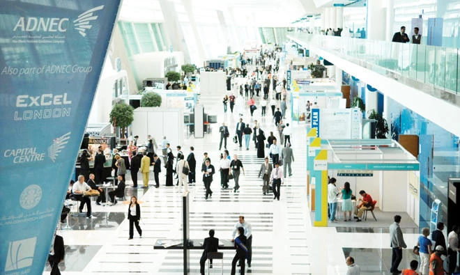 This file photo shows visitors attending an exhibition at the Abu Dhabi National Exhibition Centre.