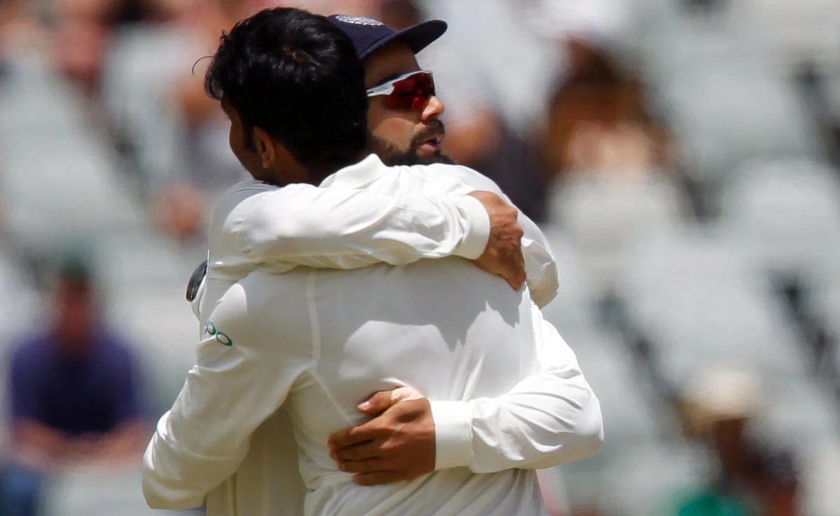 India’s Virat Kohli congratulates his team-mate Jasprit Bumrah after the fall of the wicket of South Africa’s AB de Villiers during their match against South Africa in Cape Town, South Africa on Jan. 8, 2018. (REUTERS)