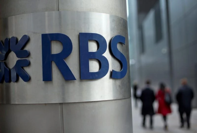 UK financial watchdog fines, bans former RBS Libor trader