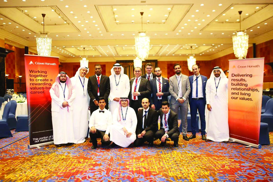 Officials and participants during a VAT seminar in Jeddah.