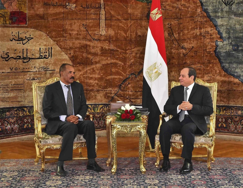 Eritrean President Isaias Afwerki, left, meets with Egyptian President Abdel-Fattah el-Sissi at the presidential palace, in Cairo. (MENA via AP)