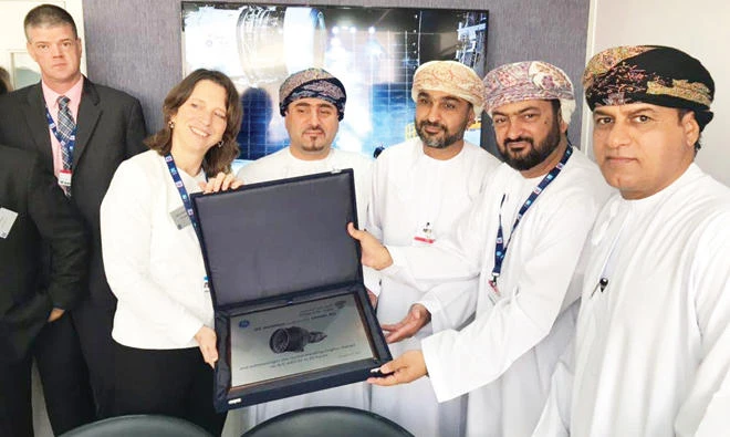Ali Redha Al-Lawatiya, executive vice president, engineering and maintenance, Oman Air, is presented with a commendation at the event.