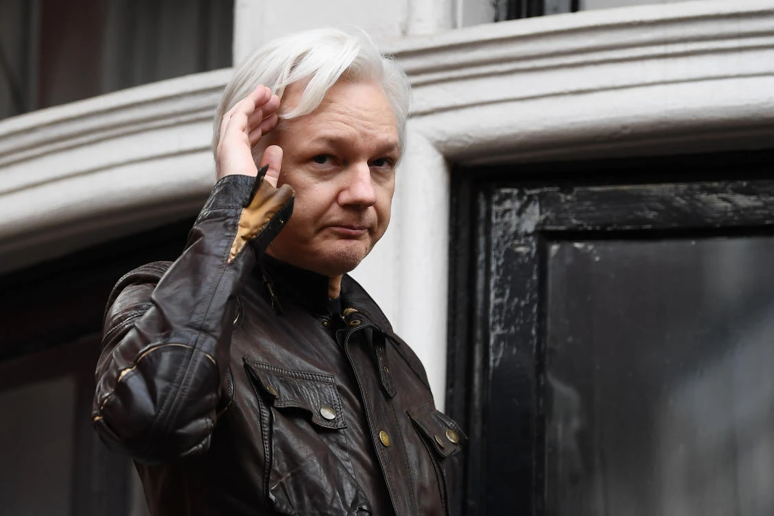 Wikileaks founder Julian Assange speaks on the balcony of the Embassy of Ecuador in London on May 19, 2017. (AFP)