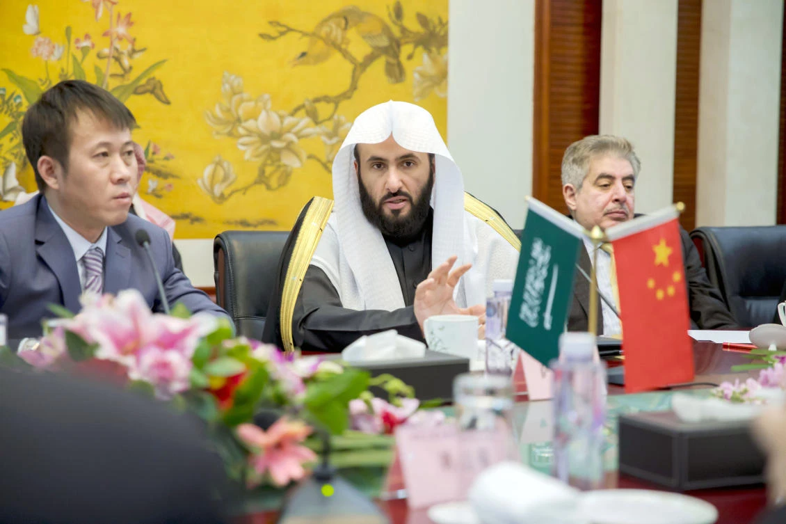 Saudi Justice Minister Walid Al-Samaani, center, speaks during a meeting with Zhang Jun, the Chinese justice minister, left, in Beijing on Tuesday. (SPA)