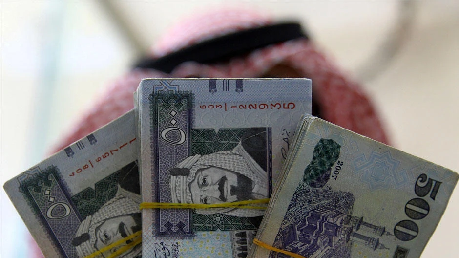The Citizens Account program aims to protect Saudi households from the impact of economic reforms, including VAT and higher petrol prices. (Reuters)