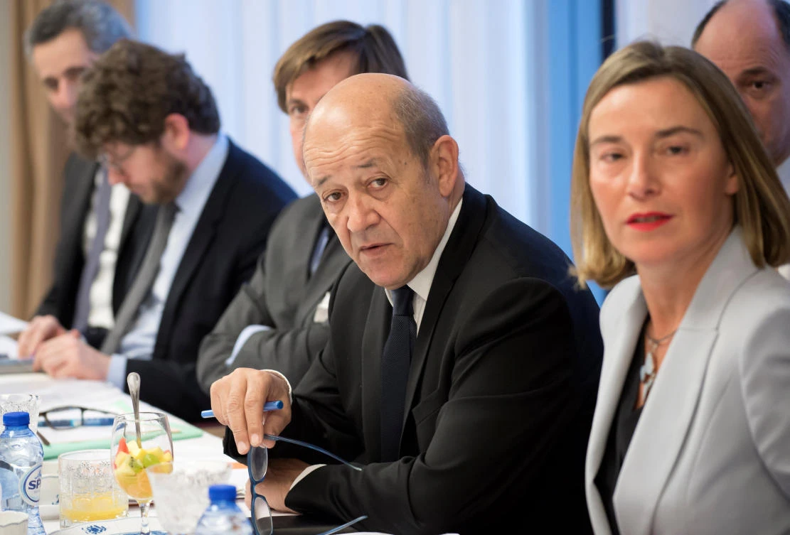 Foreign ministers of the three European powers and EU foreign policy chief Federica Mogherini (R) made their plea after a meeting in Brussels. (Reuters)