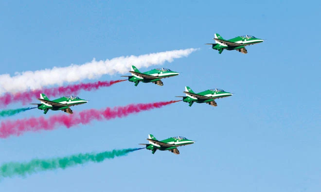 Aircraft perform during the 4th Saudi Aviation Forum at Thumamah Airport on Thursday. (SPA, Reuters, AFP)