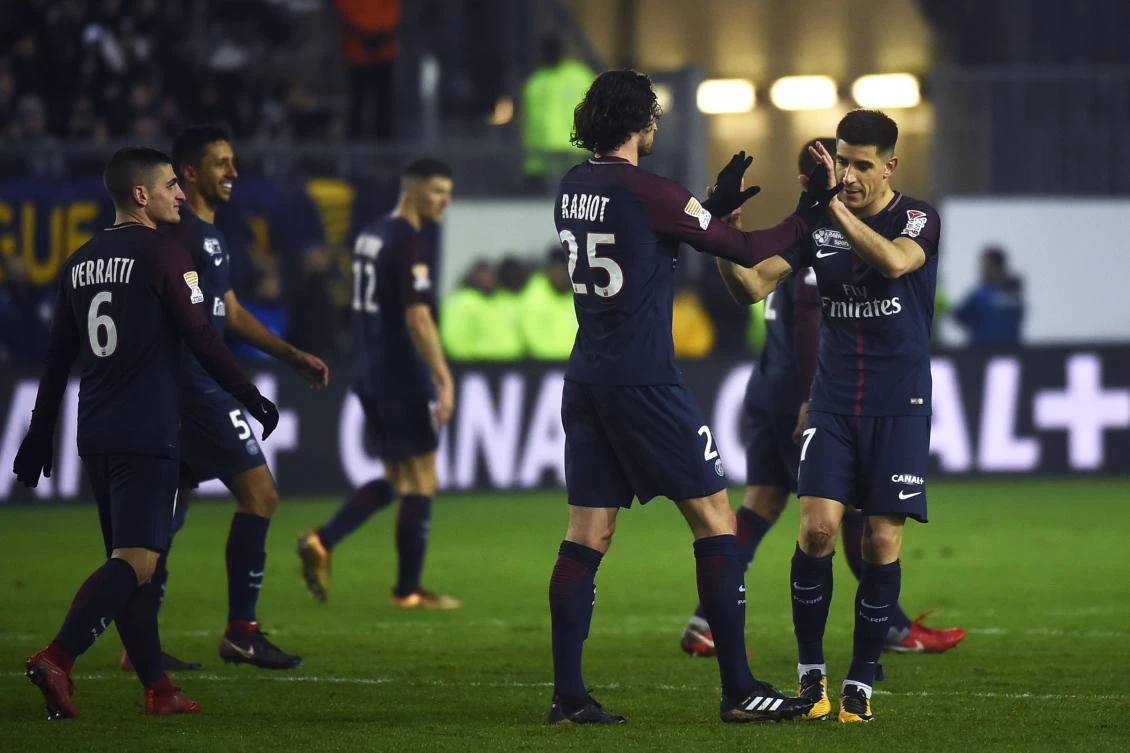 Paris Saint-Germain's French midfielder Adrien Rabiot, center, celebrates with teammates after scoring a goal during their French League Cup quarter-final football match between Amiens. It took referee Nicolas Rainville about a minute to confirm PSG’s second goal in the 2-0 win over Amiens. (AFP)