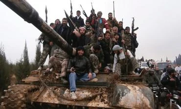Syria has accused Turkey of helping anti-government rebels, above, launch a counter attack against the Syrian army and its allies in the northwest of the country. (Reuters)