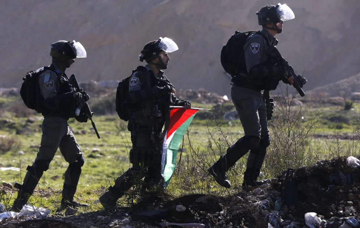 Israeli border guards prepare to disperse a protest by Palestinians against the US’ decision to recognize Jerusalem as the capital of Israel, on January 9, 2018 north of Ramallah in the Israeli-occupied West Bank. (AFP)