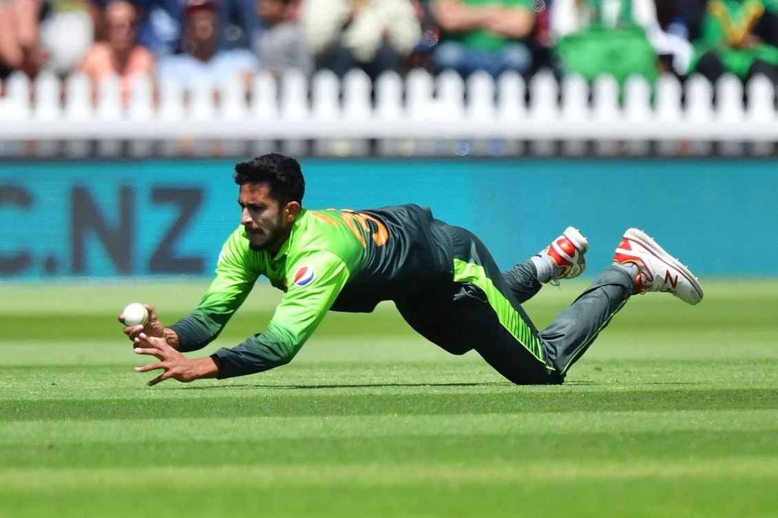 Pakistan’s Hasan Ali takes the catch of New Zealand’s captain Kane Williamson during the first one-day international cricket match between New Zealand and Pakistan at the Basin Reserve in Wellington on Jan. 6, 2018. (AFP)