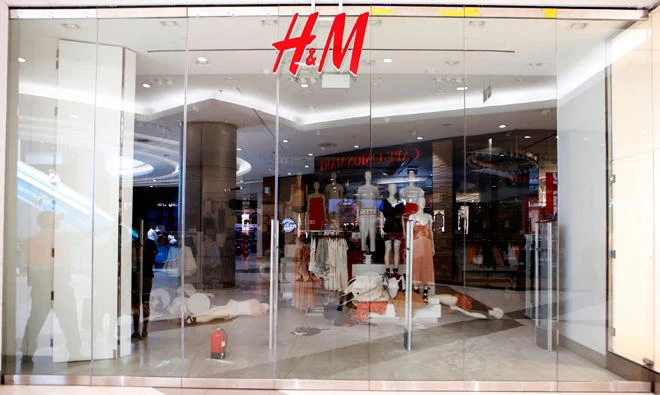 Swedish clothing giant H&M on Jan. 8 said it had withdrawn from sale a green hoodie with the inscription "coolest monkey in the jungle" after an ad featuring a black child triggered racism accusations. (AFP)