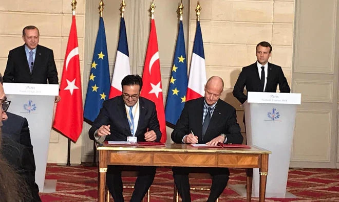 Turkish Airlines and Airbus signed the agreement in Paris in the presence of French President Emmanuel Macron and Turkish President Recep Tayyip Erdogan.